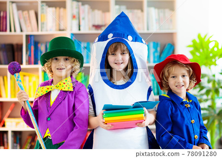 Kids in book character costume. School party. 78091280