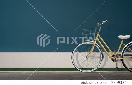 Maid Bicycle or City Bike Parking against the Wall. Car Free Day. Eco Friendly Vehicle. Environmental Care and Reduce Carbon Concept. Outdoor scene. Daylight 78093844