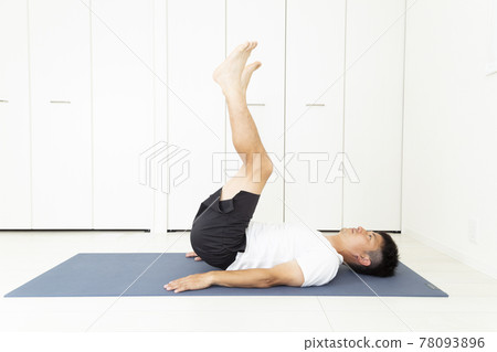 A man stretching 78093896