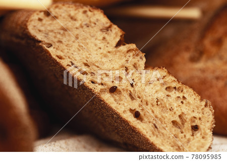 Macro shot of freshly baked bread loaf Macro shot of freshly baked bread loaf 78095985