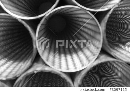 Abstract background of steel pipes. Construction equipment.	 78097115