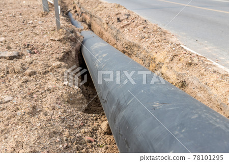 Construction site with new Water Pipes in the ground.  78101295