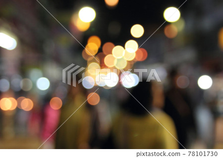Defocused abstract bokeh of night market background. Defocused abstract bokeh of night market background. 78101730