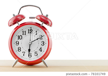 alarm clock on the table on white background. alarm clock on the table on white background. 78101749