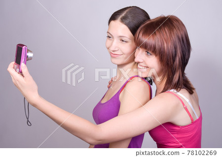 Two girls and a camera 78102269