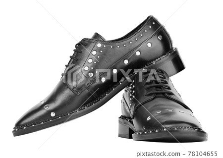 Women's leather boots close-up black color. Oxford style shoes. Casual shoes. 78104655
