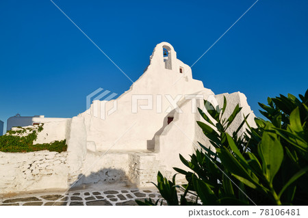 Famous tourist landmark, Mykonos, Greece. White Greek Orthodox church of Panagia Paraportiani, town of Chora on island at sunrise. Iconic destination Famous tourist landmark, Mykonos, Greece. White Greek Orthodox church of Panagia Paraportiani, town of Chora on island at sunrise. Iconic destination 78106481