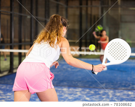 Padel tennis woman in court ready for play 78108682