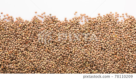 Raw lentils on white background 78110209