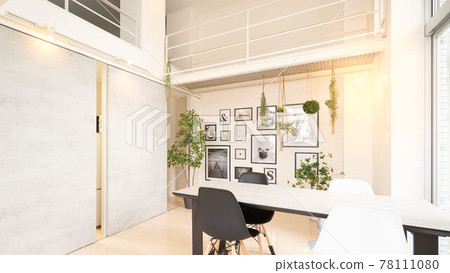 A room with a picture frame on the wall 78111080