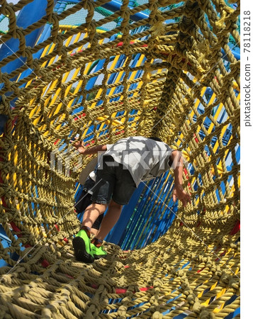 Boy playing with plaything 78118218