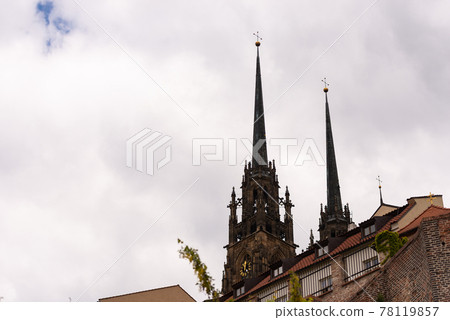 The Cathedral of Brno. Spires of the temple over the roofs of houses. 78119857