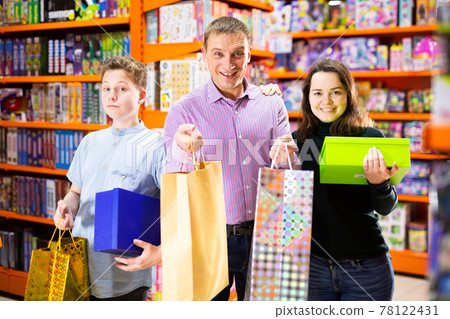 Friendly family with toys purchased in kids mall Friendly family with toys purchased in kids mall 78122431