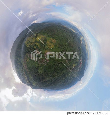 Little planet 360 degree sphere. Panorama of aerial view of cars driving on curved, zigzag curve road or street on mountain hill with natural forest trees in rural area of Phetchabun, Thailand. Little planet 360 degree sphere. Panorama of aerial view of cars driving on curved, zigzag curve road or street on mountain hill with natural forest trees in rural area of Phetchabun, Thailand. 78124302