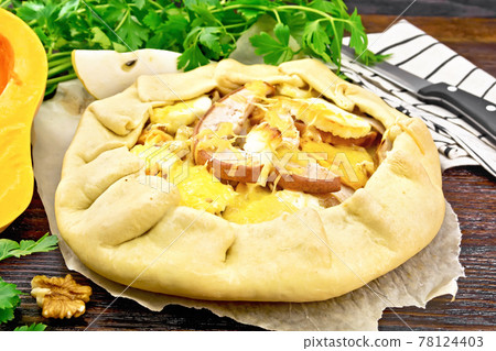 Galeta with pumpkin and pear on dark board 78124403