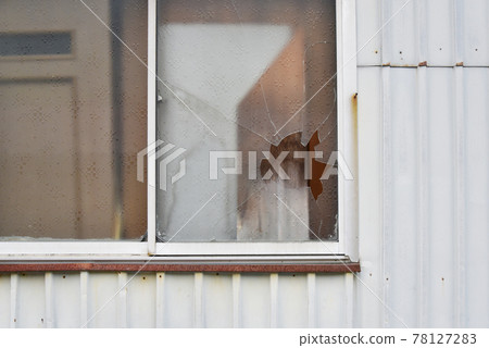 Broken window glass Broken window glass 78127283