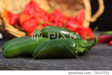 Jalapeno and Cayenne Peppers at rural farmers market 78127712
