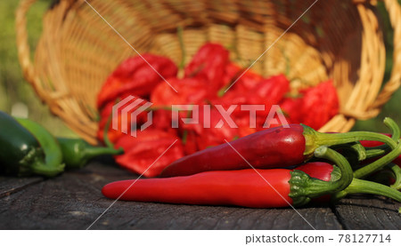 Jalapeno and Cayenne Peppers at rural farmers market 78127714