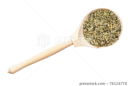 top view of freekeh wheat grains in wood spoon 78128778