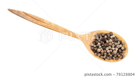 top view of monk's pepper (vitex) in wood spoon 78128804