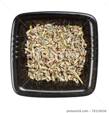 old dried lavender in black bowl isolated 78128836