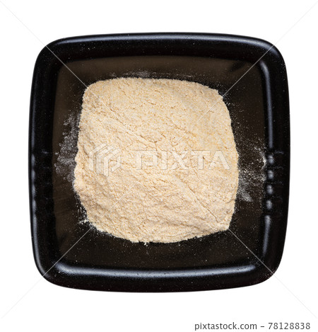 apple pectin powder in black bowl isolated 78128838