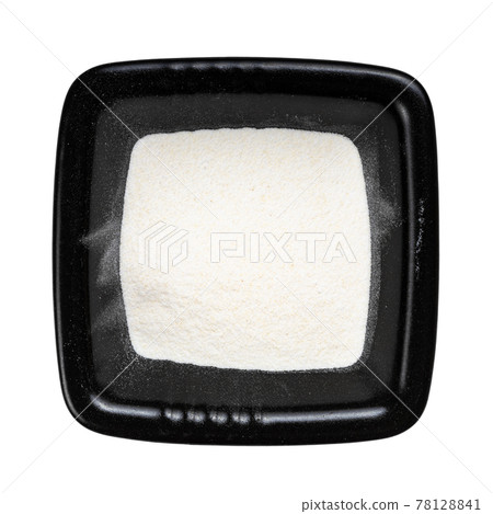 top view of agar powder in black bowl isolated 78128841