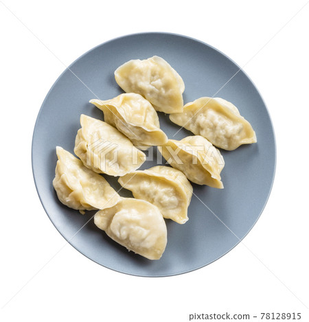 top view of several boiled dumplings on gray plate top view of several boiled dumplings on gray plate 78128915
