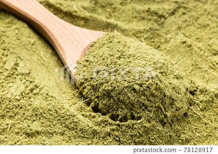 wooden spoon with milled stevia rebaudiana herb wooden spoon with milled stevia rebaudiana herb 78128917