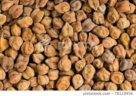 background - many raw black chickpeas 78128956