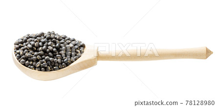 whole black urad beans in wooden spoon isolated whole black urad beans in wooden spoon isolated 78128980