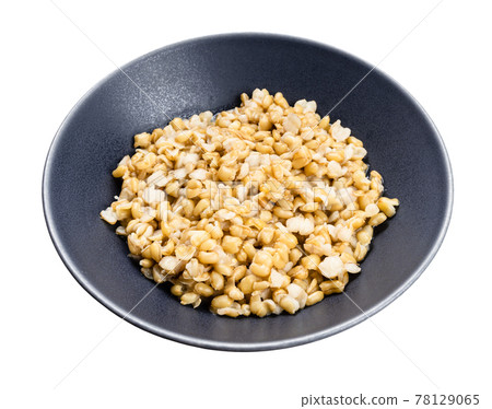 porridge from kamut khorasan wheat in gray bowl 78129065