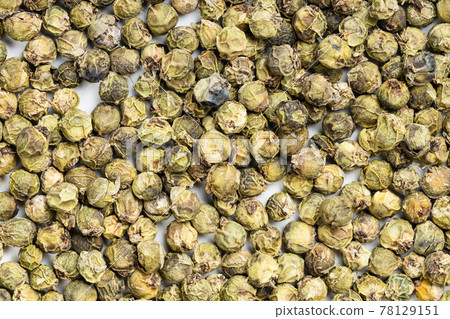 background - many green pepper peppercorns background - many green pepper peppercorns 78129151