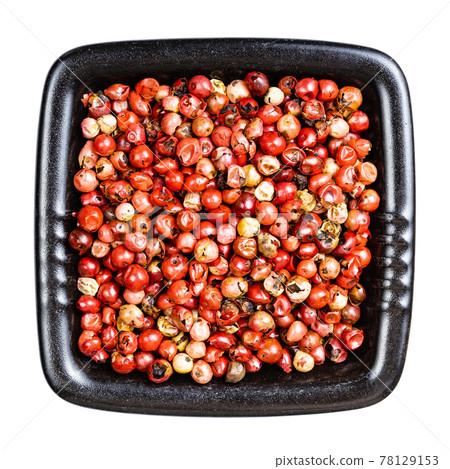pink peppercorns (Baie rose) in bowl isolated pink peppercorns (Baie rose) in bowl isolated 78129153