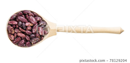 top view of spoon with red spotted pinto beans 78129204