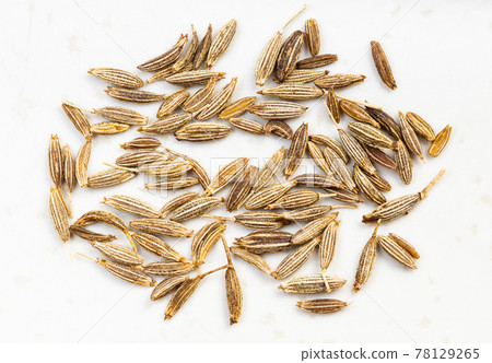several cumin (cuminum cyminum) seeds close up several cumin (cuminum cyminum) seeds close up 78129265