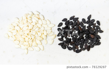 top view of black and white sesame seeds 78129287