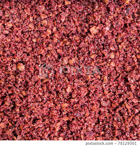 ground sumac spice close up 78129301