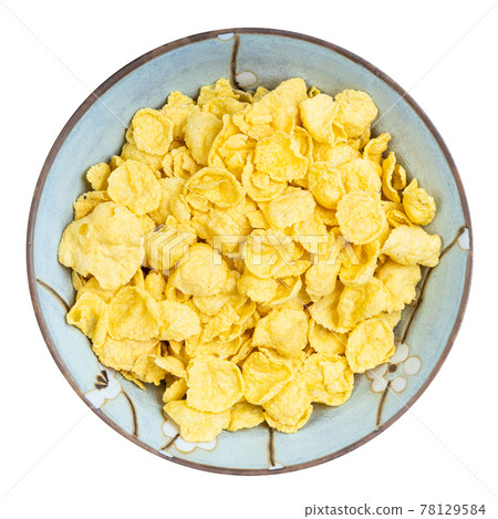 sugar-free corn flakes in round bowl isolated 78129584