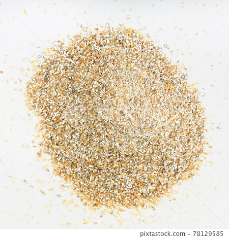 top view of pile of rye bran close up on gray 78129585