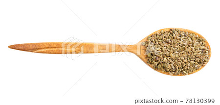 top view of wood spoon with ajwain seeds isolated top view of wood spoon with ajwain seeds isolated 78130399