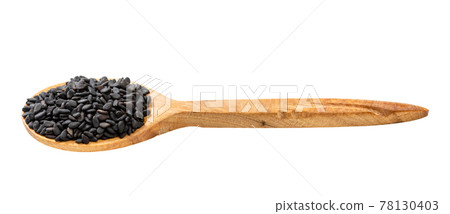 wooden spoon with raw black sesame seeds isolated 78130403