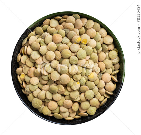 whole large green lentils in round bowl isolated whole large green lentils in round bowl isolated 78130454
