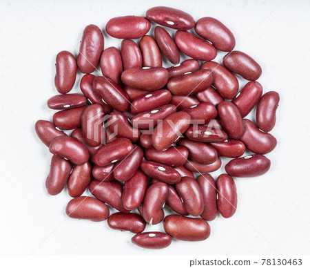 pile of raw kidney beans close up on gray pile of raw kidney beans close up on gray 78130463