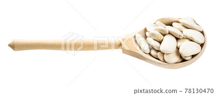 wooden spoon with lima beans isolated 78130470