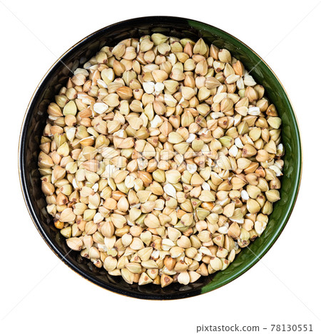 raw green buckwheat in round bowl isolated 78130551