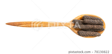 top view of wood spoon with java long peppers top view of wood spoon with java long peppers 78130822