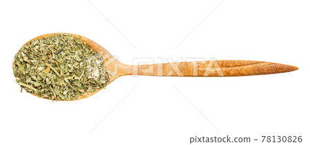 top view of spoon with ground parsley isolated top view of spoon with ground parsley isolated 78130826