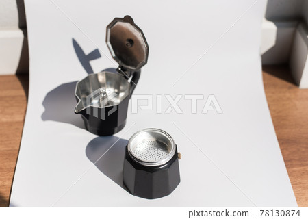 Mocha Pot coffee machine Laid on white Mocha Pot coffee machine Laid on white 78130874