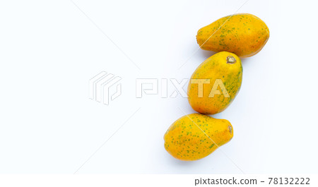 Papaya fruit on white background. Papaya fruit on white background. 78132222